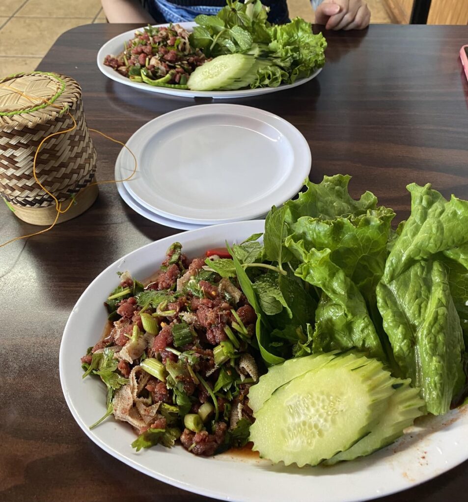 Raw beef laarb and papaya salad, extra spicy
