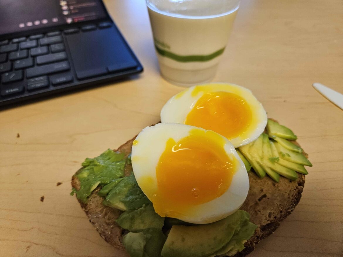 bread with peanut butter, avocado and a soft boiled egg