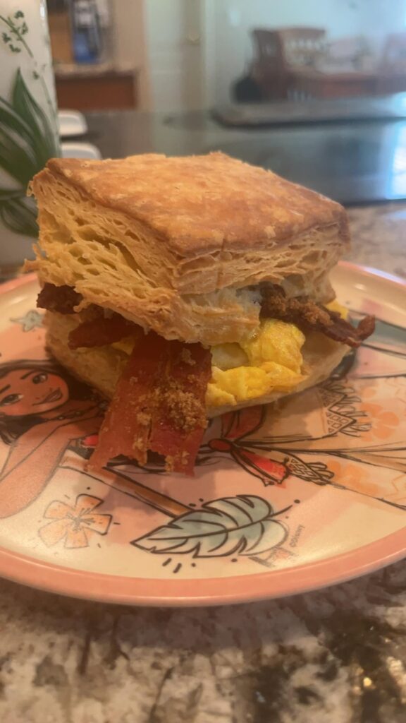 Biscuit, egg, and seasoned bacon 😍