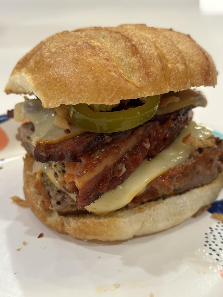 Leftover meatloaf sandwich with bacon, fried onions, and BBQ