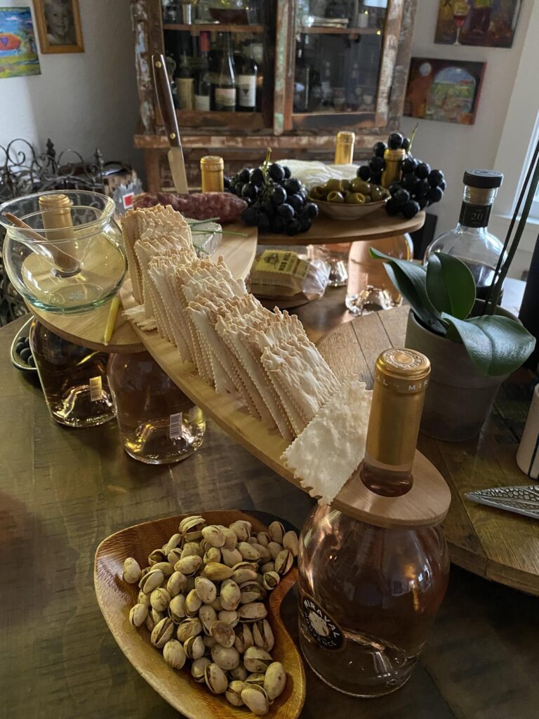 I got really bitchin' multi-level cutting boards that use wine bottles as the base. Here's my art!