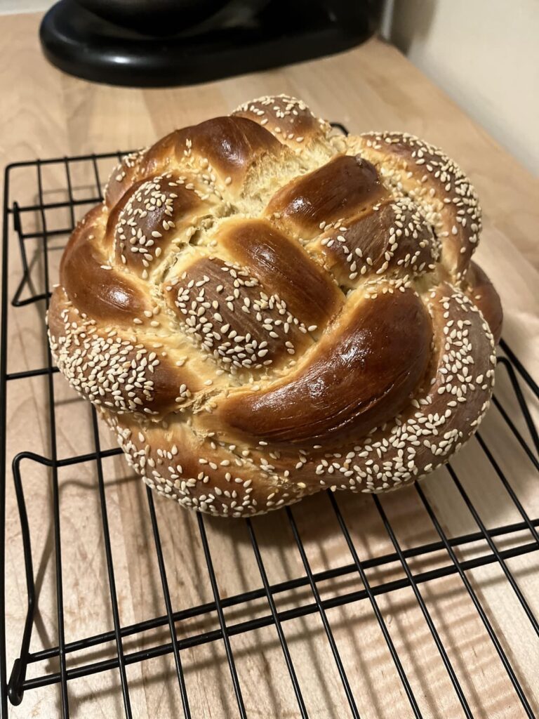 ‘Tis the season, so I thought I’d give the challah another go. Subbed out the sugar for local honey, then rolled half of the strands in sesame seeds before making an 8 strand round braid.