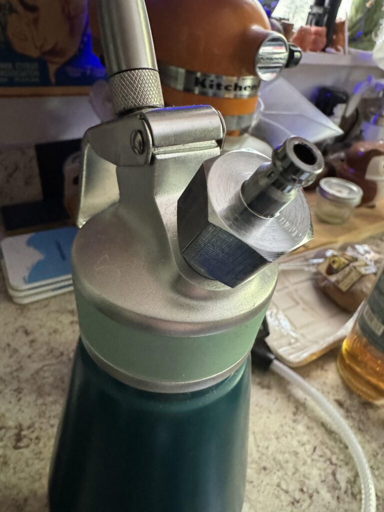 Trying to connect a tank to a whipped cream (nitro coffee) caniser. What kind of connector is this?