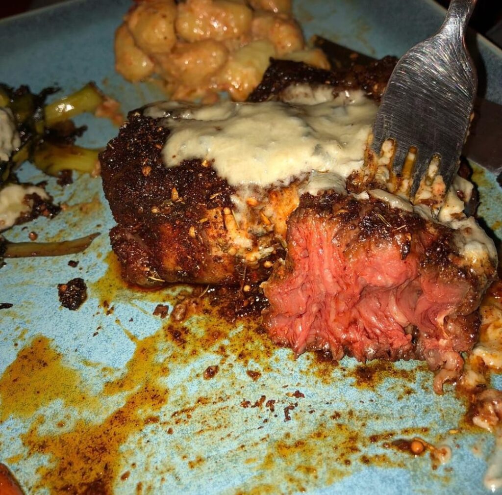 Ribeye cap with bleu cheese sauce. 129F bath + sear in cast iron w/ brown butter