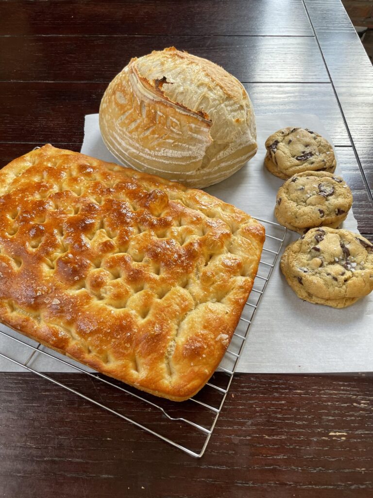 Sourdough loaf, discard chocolate chip cookies, and focaccia to give to family and friends this weekend!