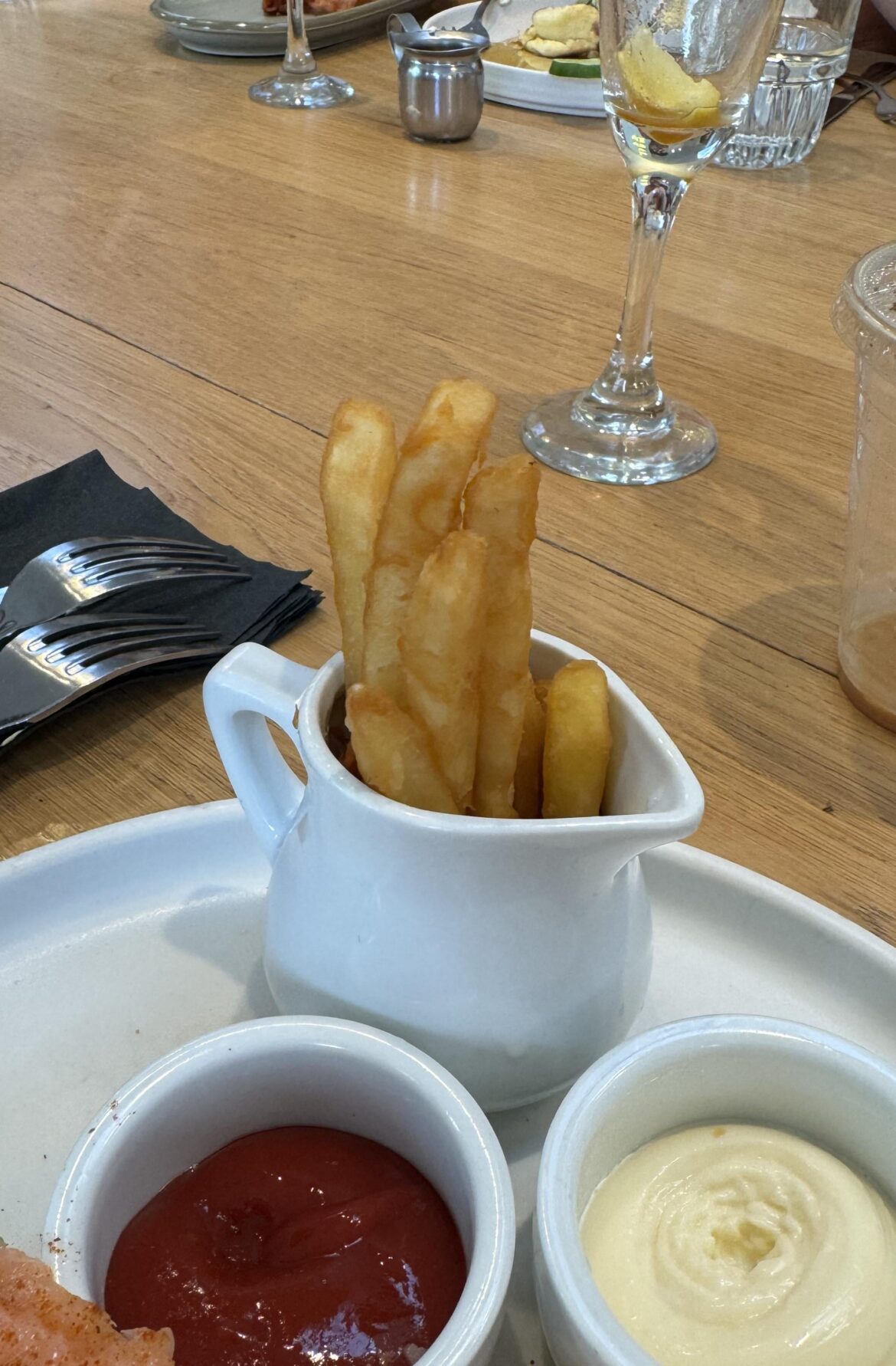 Fries stuffed in a mini pitcher
