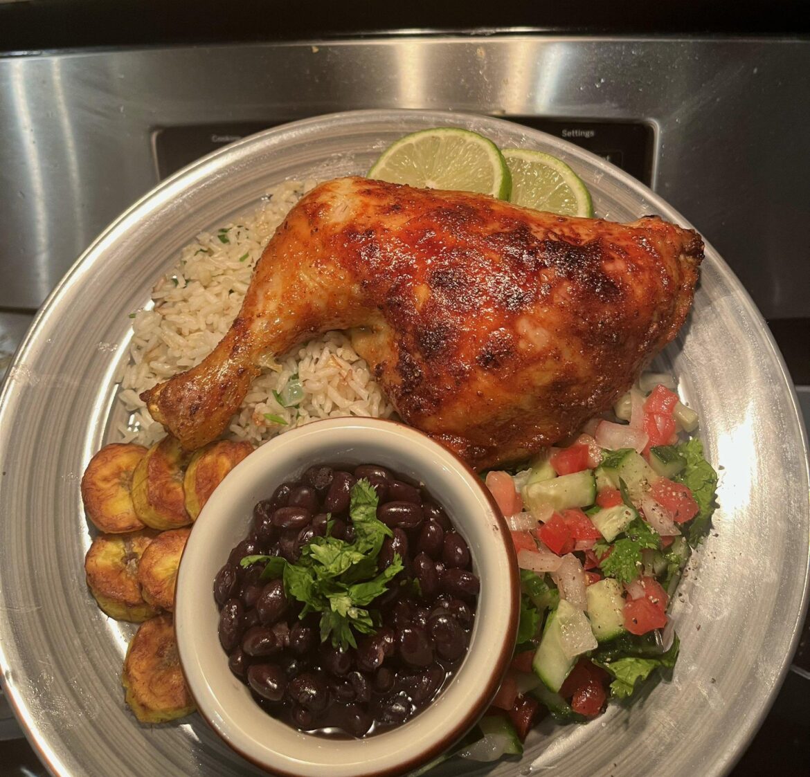 Honey Sazon chicken leg quarters, cilantro lime rice, and black beans