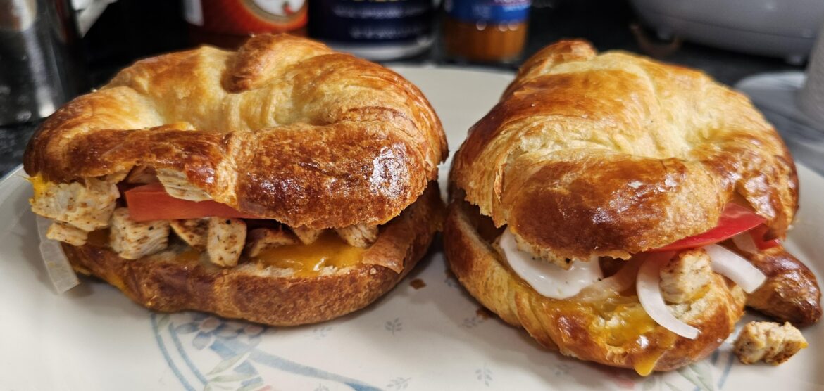 Spicy Cajun chicken on medium sized croissants.