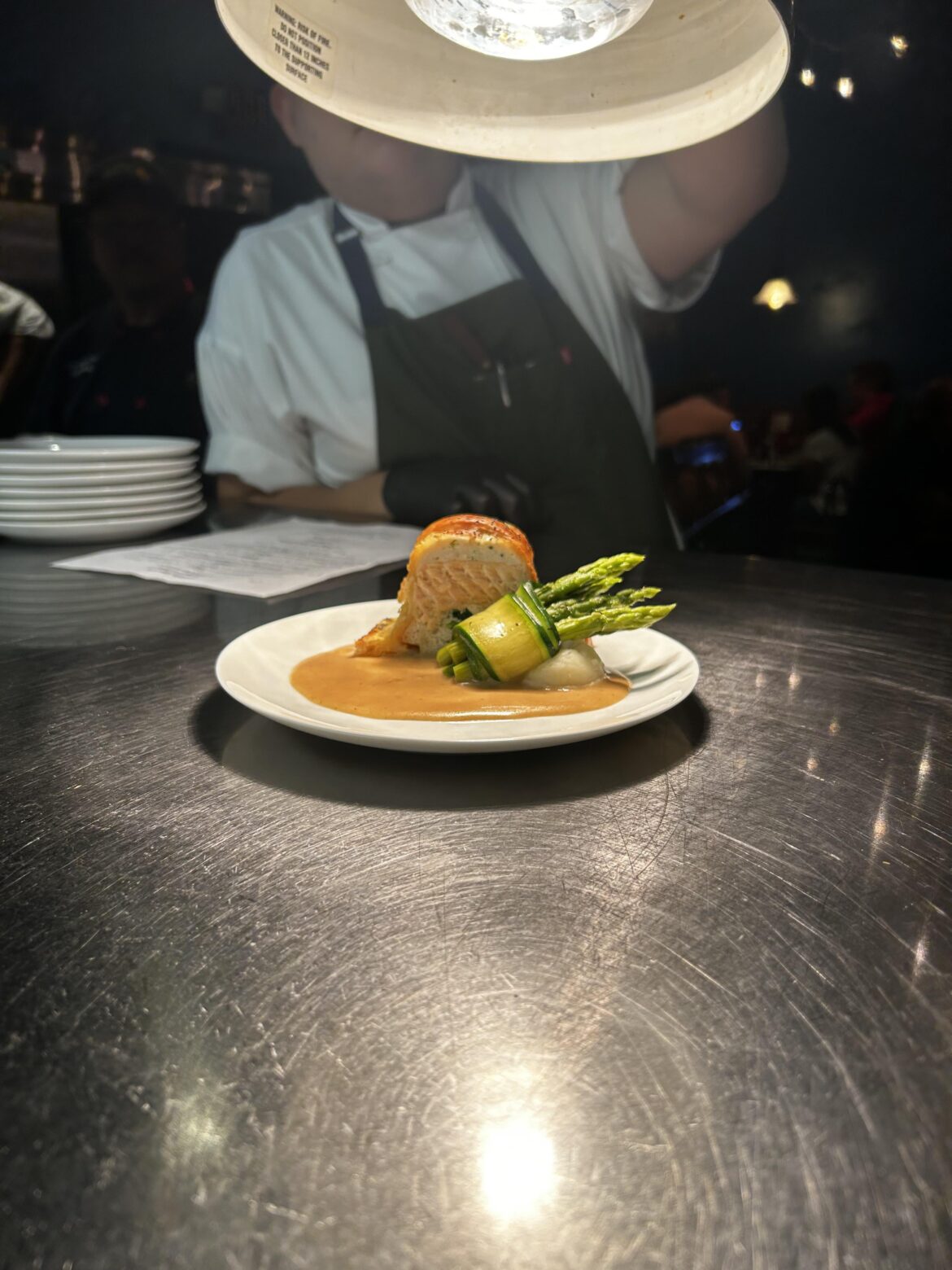 Salmon Strudel with spinach on a lobster cognac cream