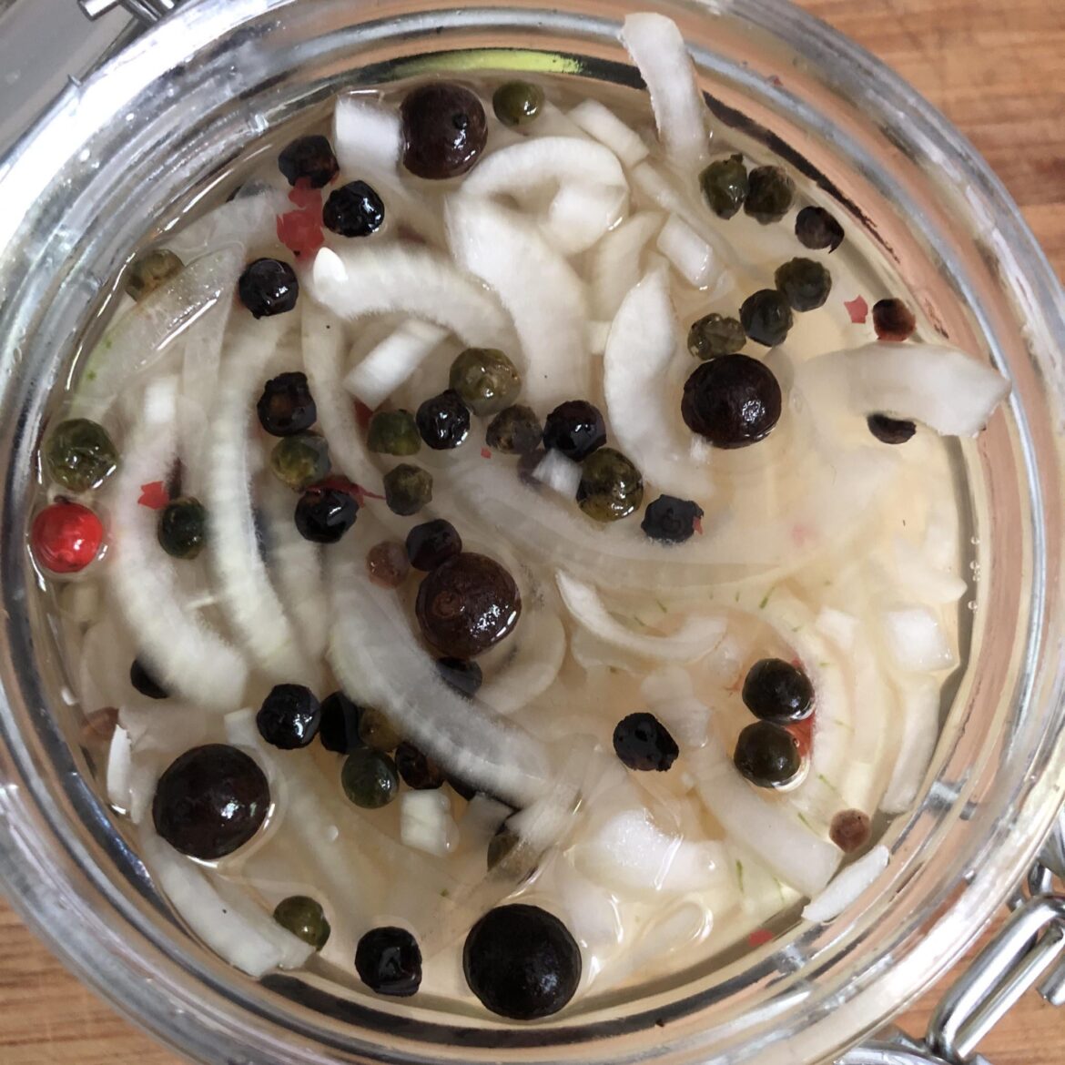 Sliced onions pickled with yuzu vinegar.