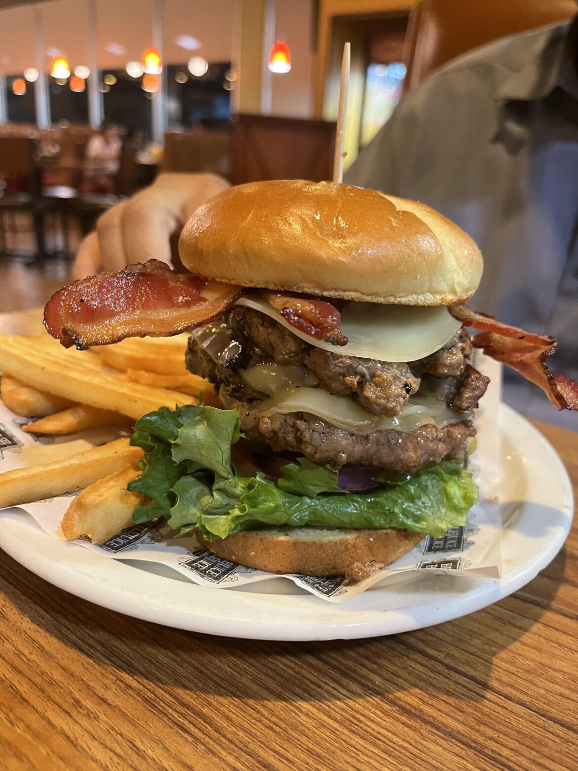 Three patty burger with bacon at Denny’s