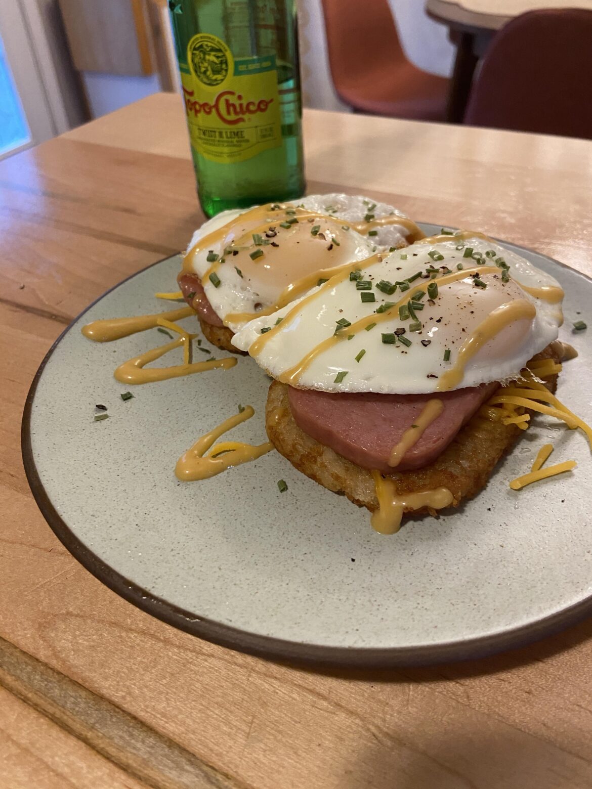 Eggs and spam on hashbrowns