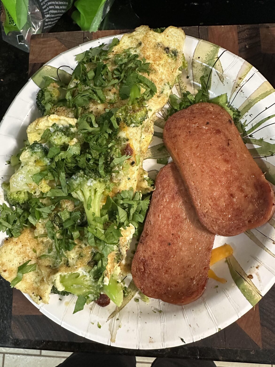 Broccoli, cheese, green onion, and cilantro omelette with spam.