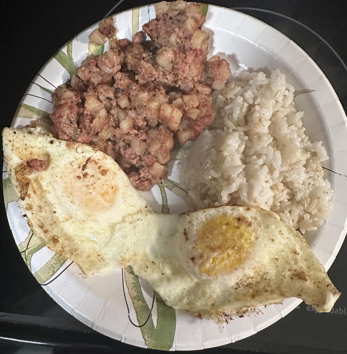 Corned beef hash, eggs, and rice