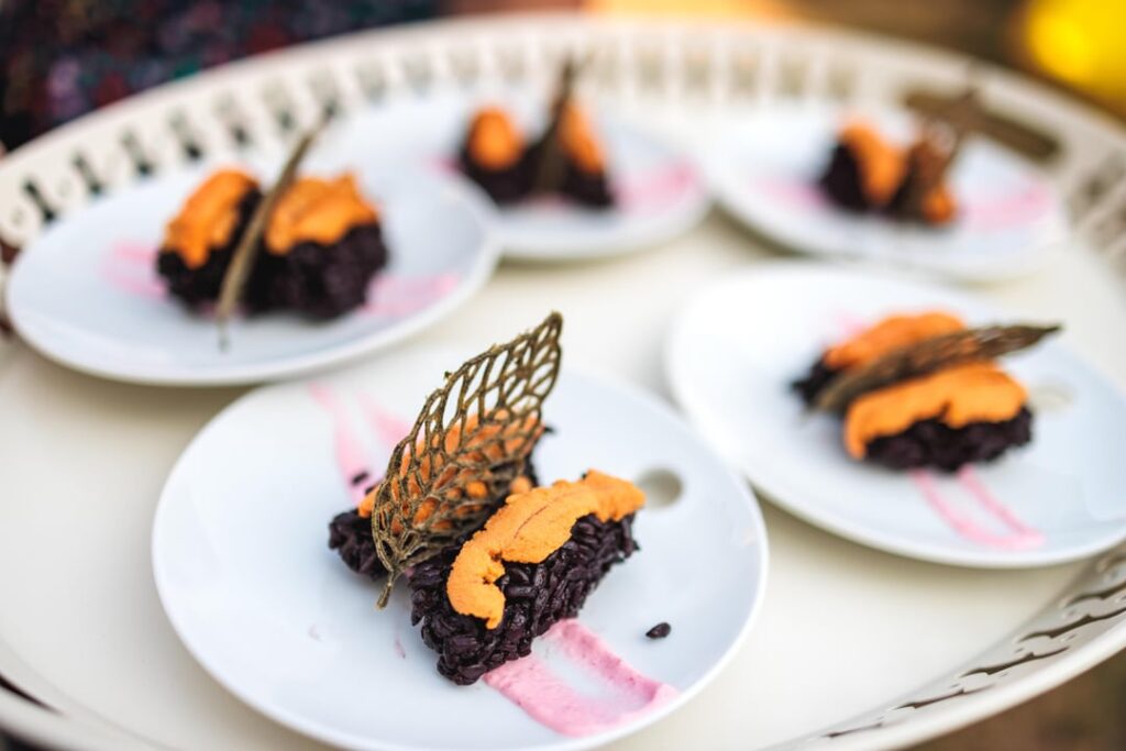 [home cook] uni black rice nigiri, huckleberry-yuzu mayo, nori tuille
