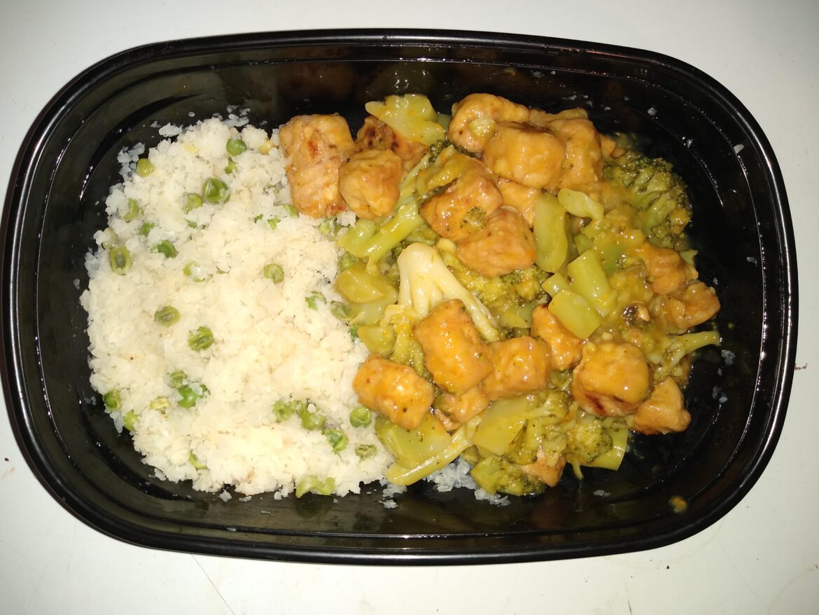 Homemade version of defunct Panda Express Impossible Orange Chick'n with broccoli and fried cauliflower rice.