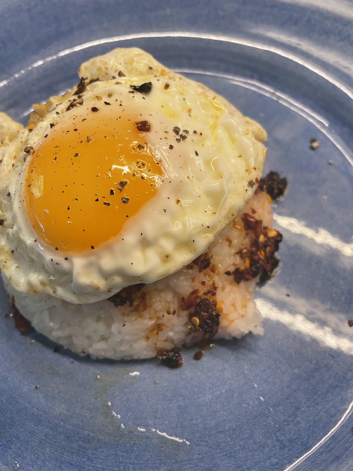 Rice, chili crisp, fried egg.