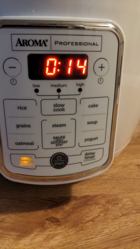 I'm getting tired of peeling and dicing sweet potatoes. What's the best way to slow cook a bunch of them with the skin on? Picture is the device I have.