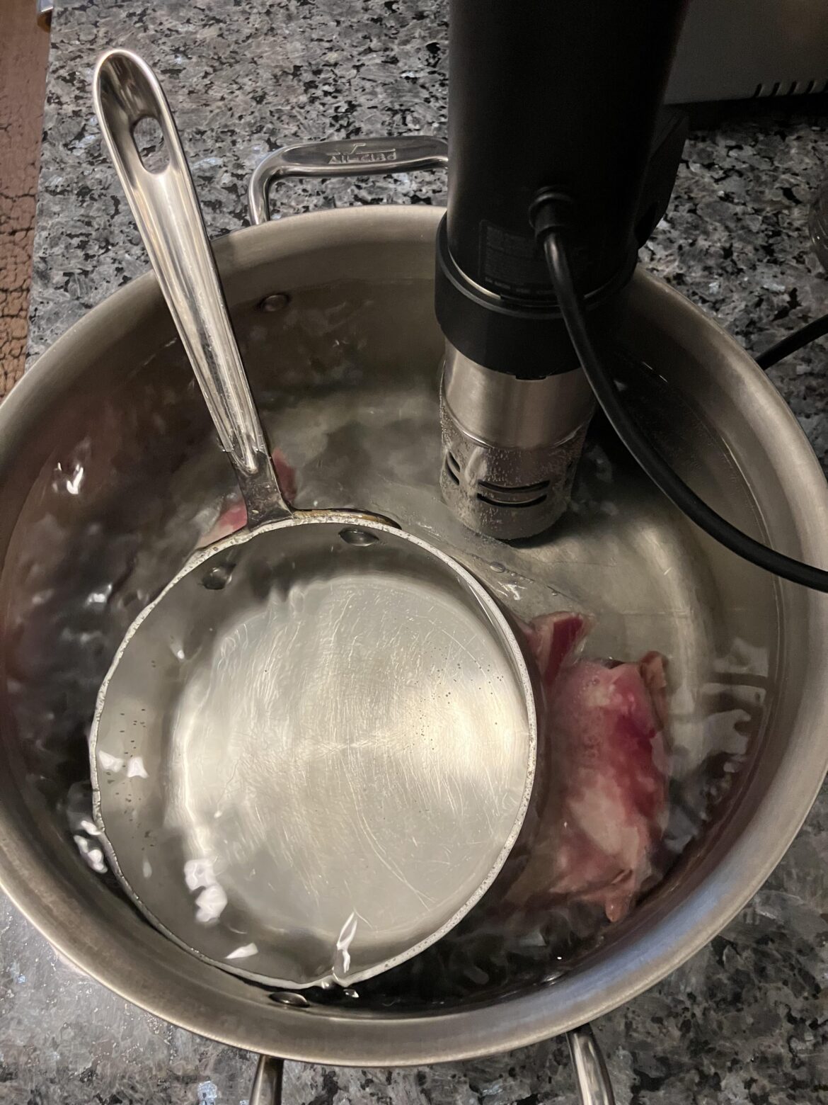 this has worked best for me for keeping food submerged