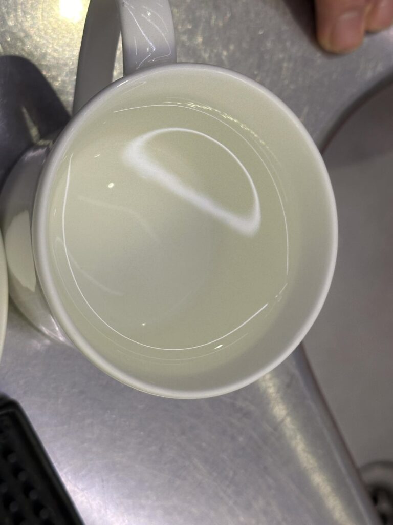 The water from coffee machine is yellowish. The normal one is from dispenser.