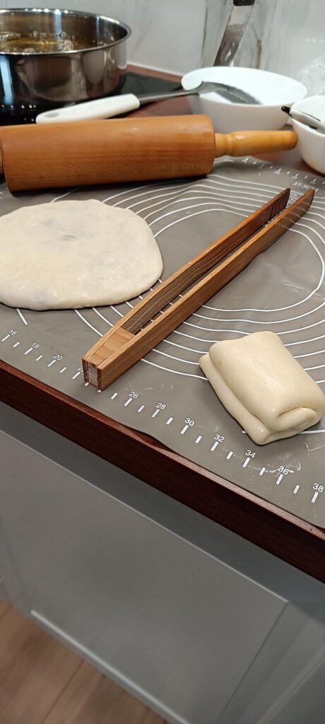 Not aware of there is any name in English. In Urdu it's "Tiki" filled with beaf mince.