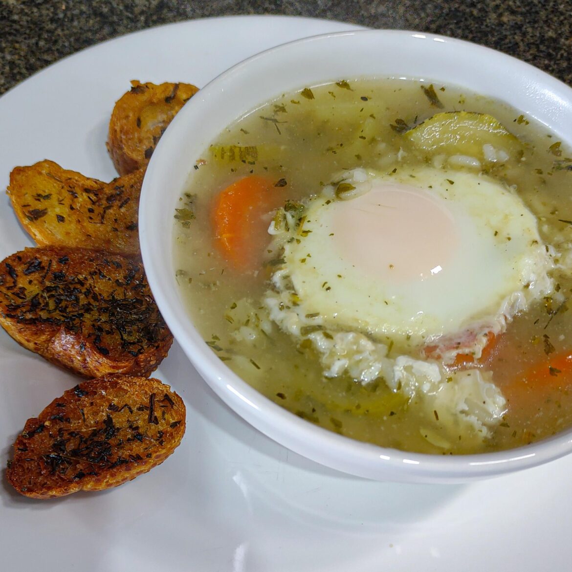 I was feeling sick so I made chicken/rice soup and I put an egg in it