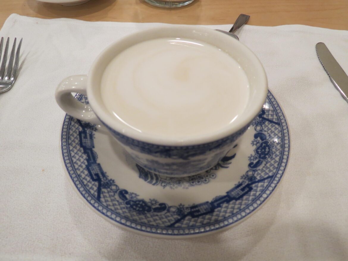 Cream over black coffee