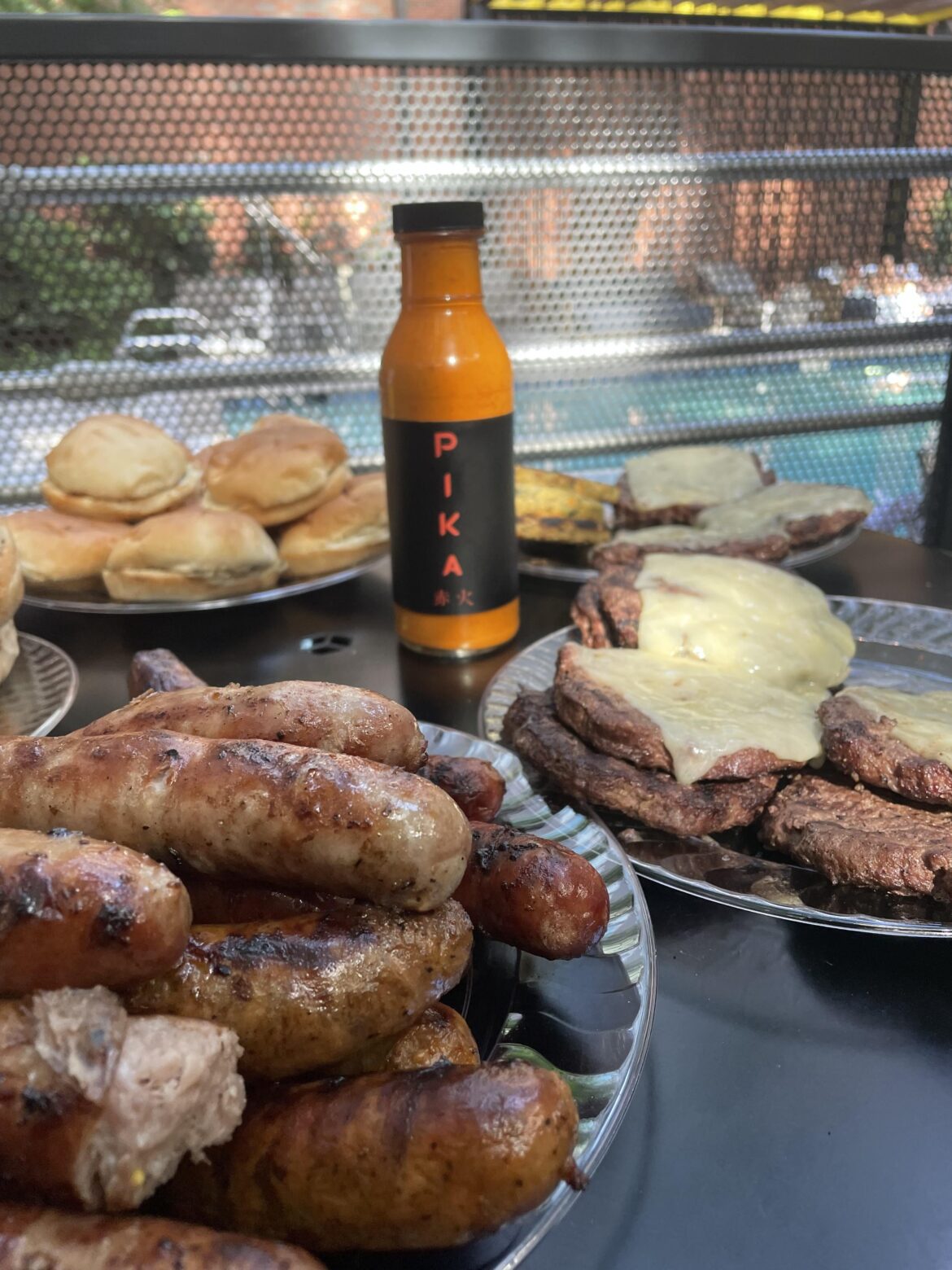Grilled burgers and dogs