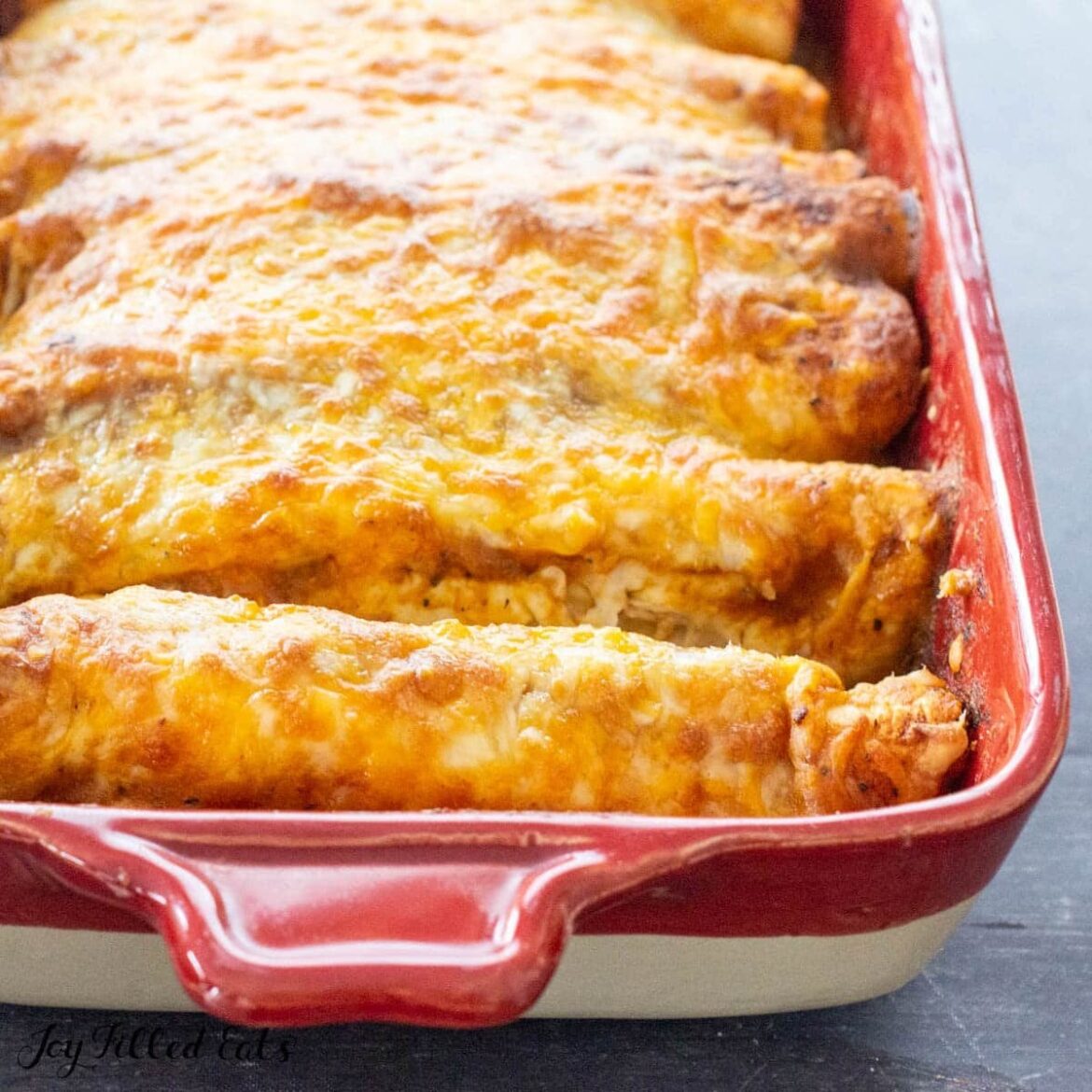 Keto enchiladas with zero carb tortillas, poblano peepers and bell peppers added