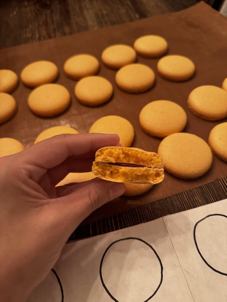 Orange macarons! 🎃 Italian method! I filled them with a pumpkin pie cheesecake white chocolate ganache and a NY cheesecake ganache with homemade caramel and a rum spiced apple filling. Delicious!