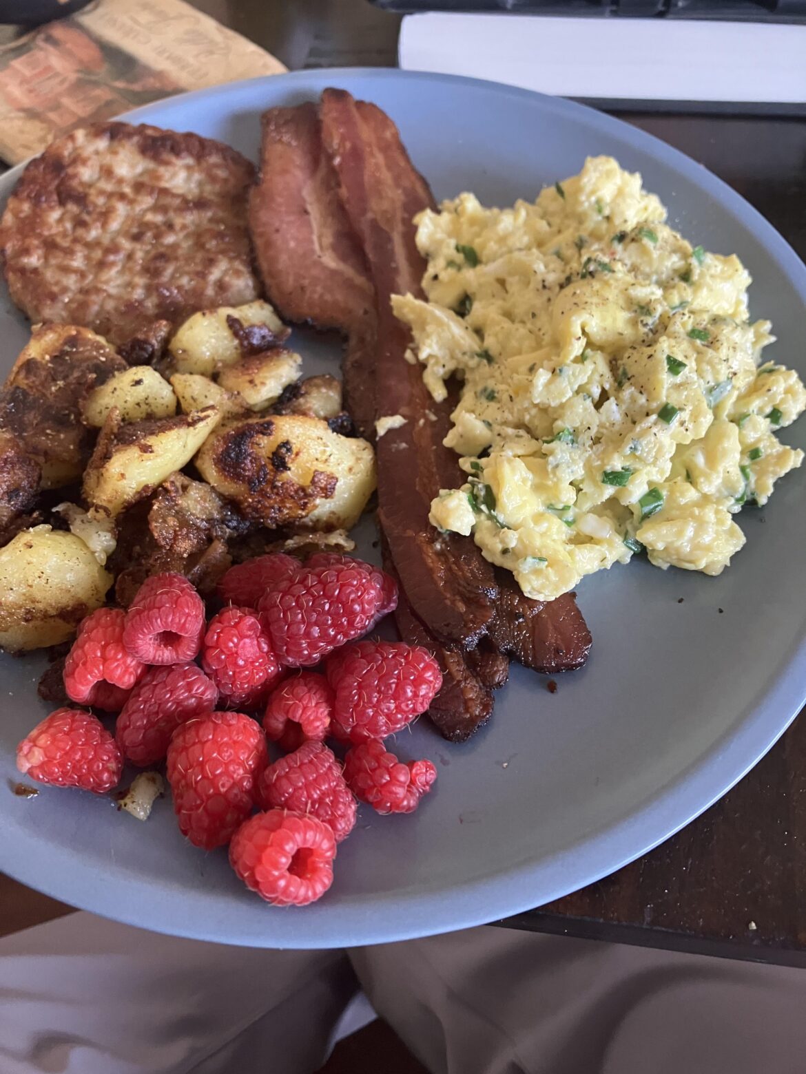 Boursin& chive soft scrambled eggs with home fries, bacon and sausage