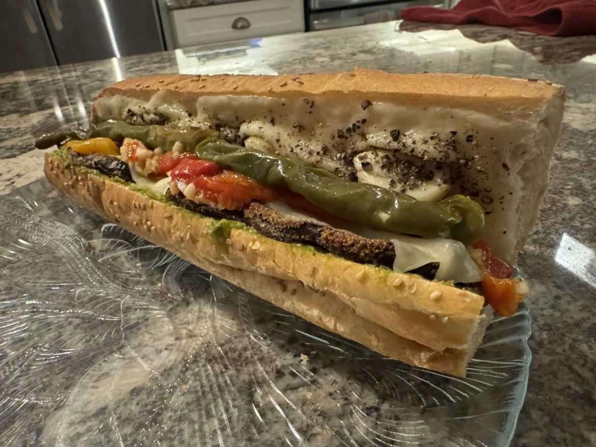 Eggplant, long hots, roasted peps, pesto, mozz, prov on semolina seeded roll