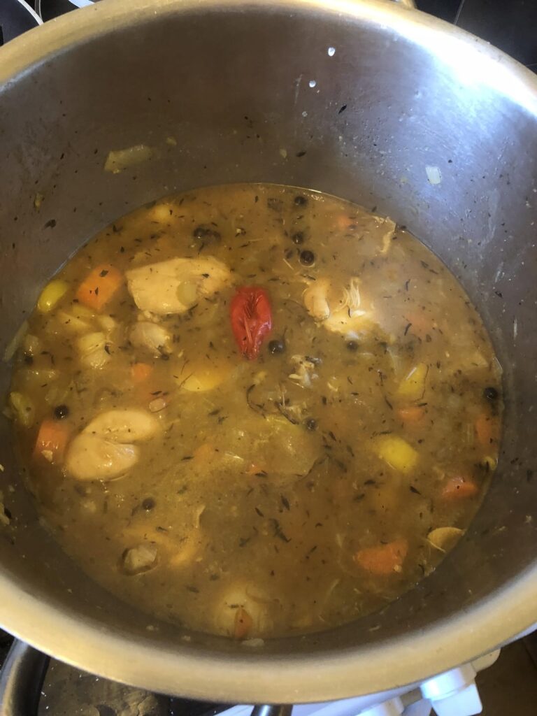 Cockrell and vegetable soup with spinners (Caribbean soup)
