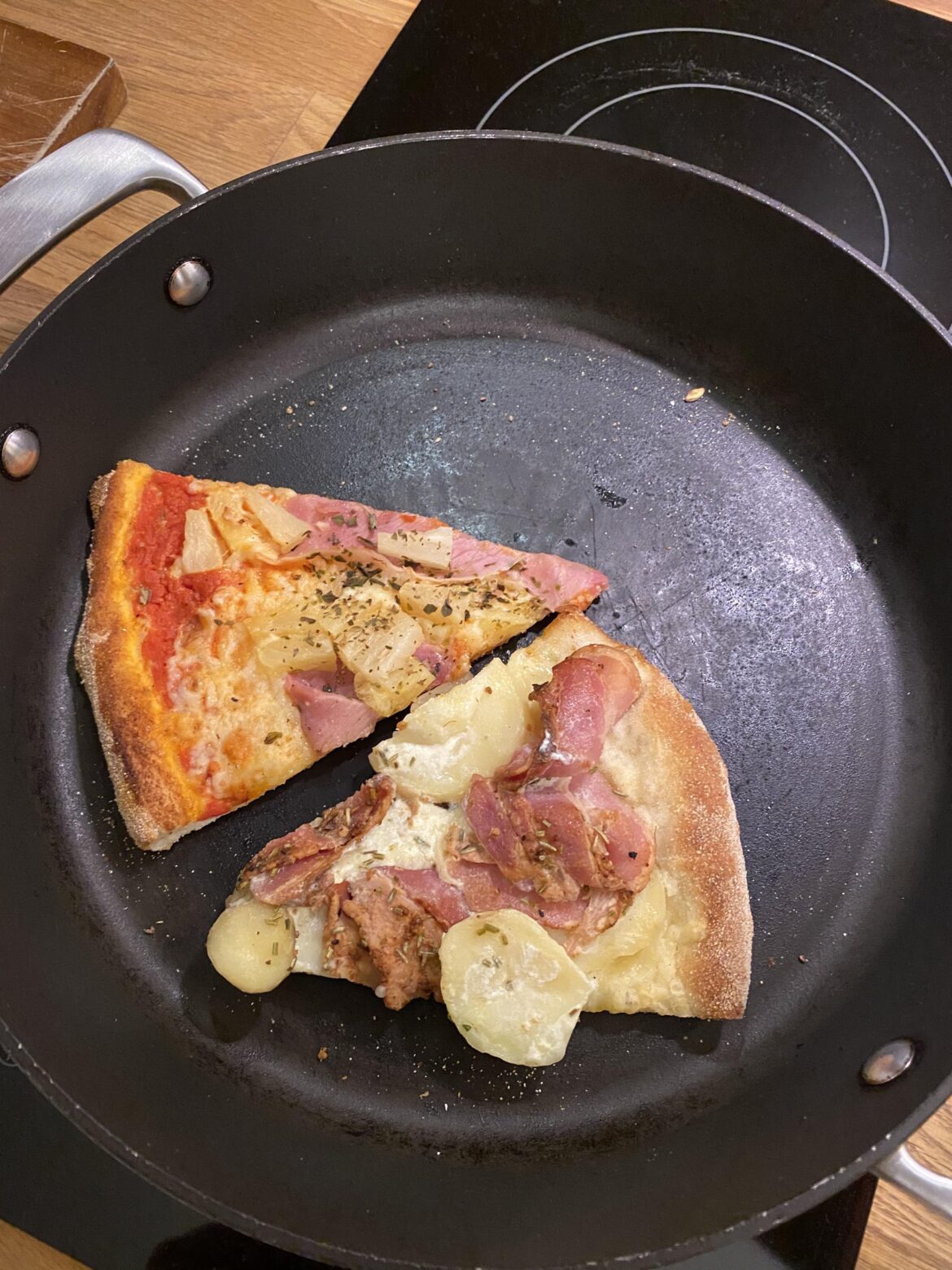 Leftover pizza tastes better after being heated hard on a pan (unpopular opinion)