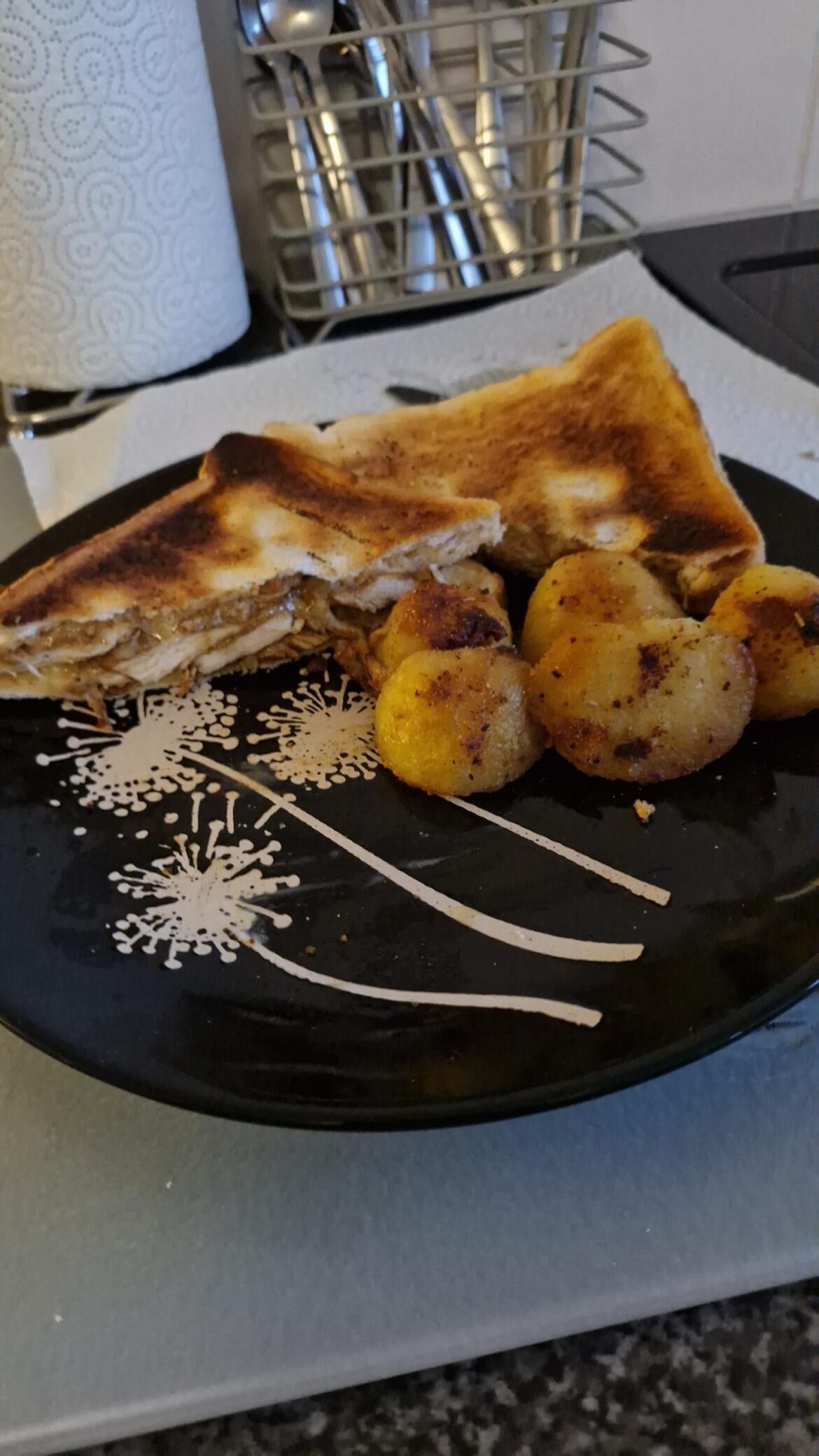 Jerk seasoned chicken steaks, melted cheeses and mayo on toasted bread.