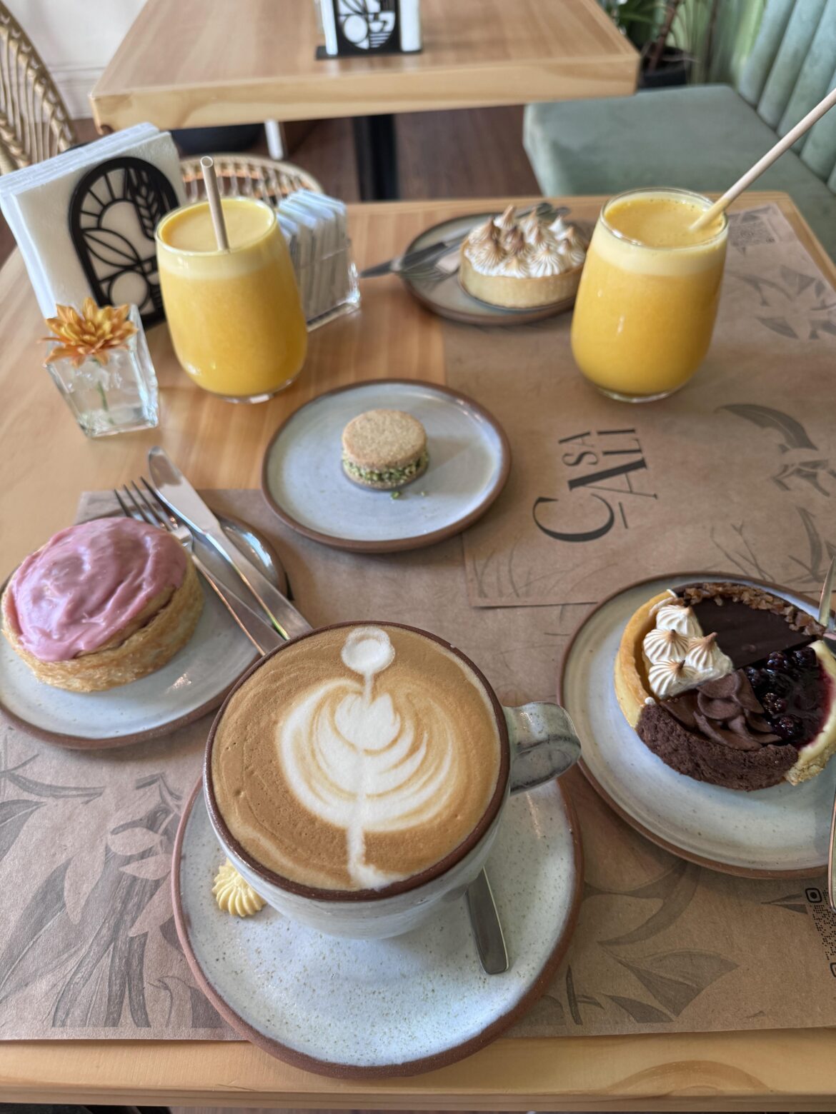 What coffee is the standard that people order anywhere and what do they always accompany it with?