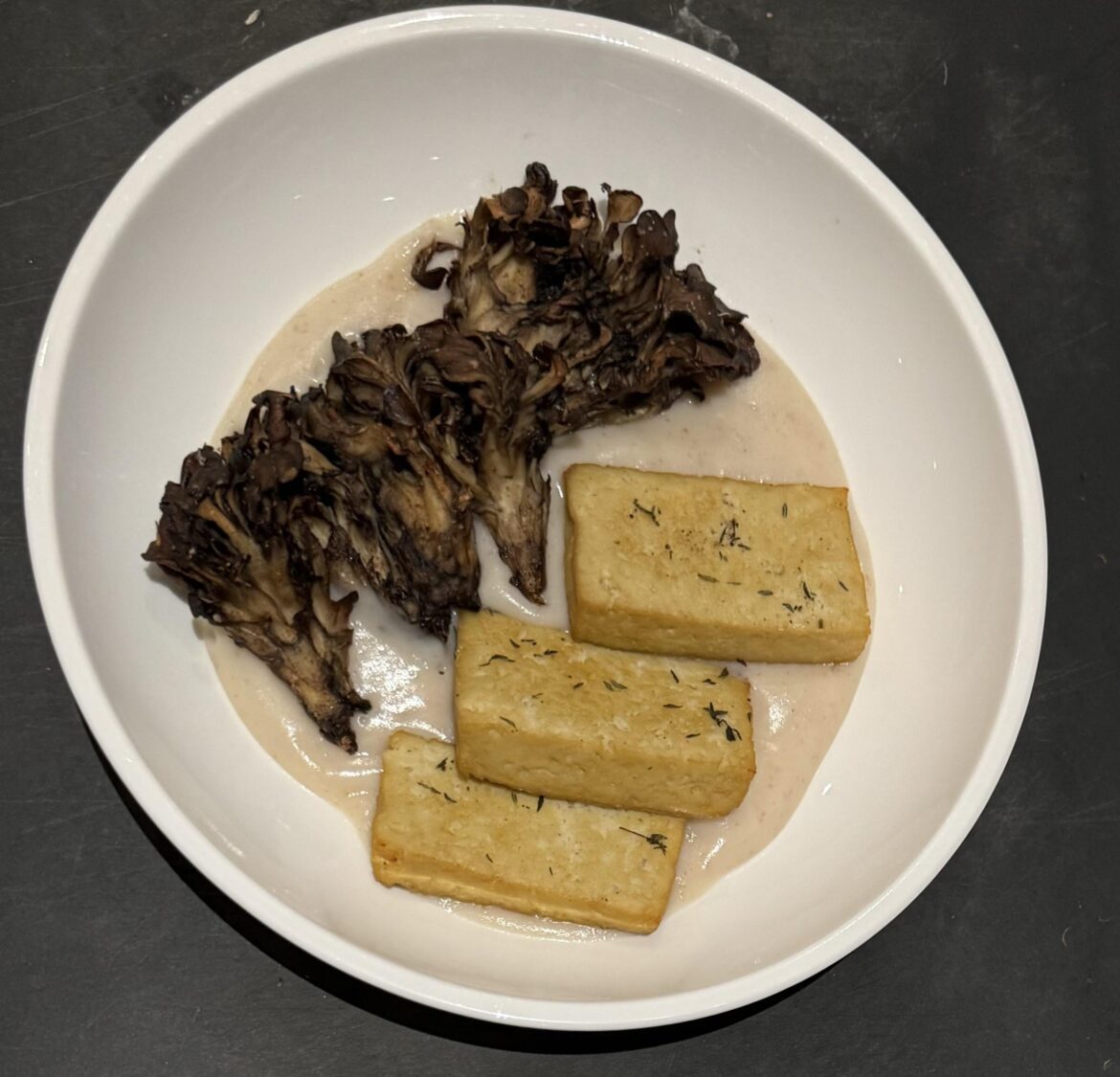 Maitake, Fava bean tofu, celery root & potato puree. 420 calories, 46g protein per serving.