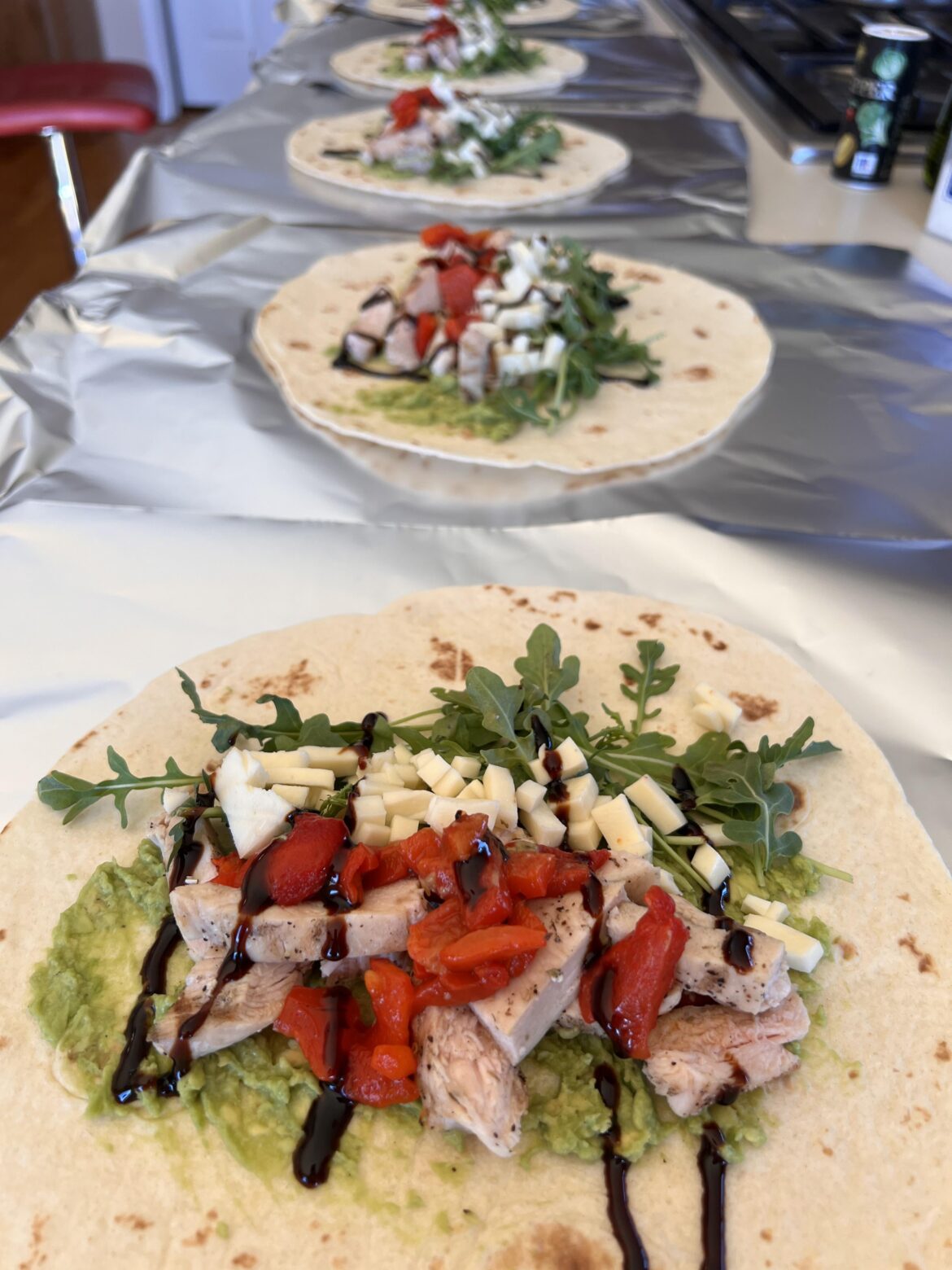 Made some grilled chicken wraps with mozz, roasted red pepp, arugula, avocado and balsamic glaze