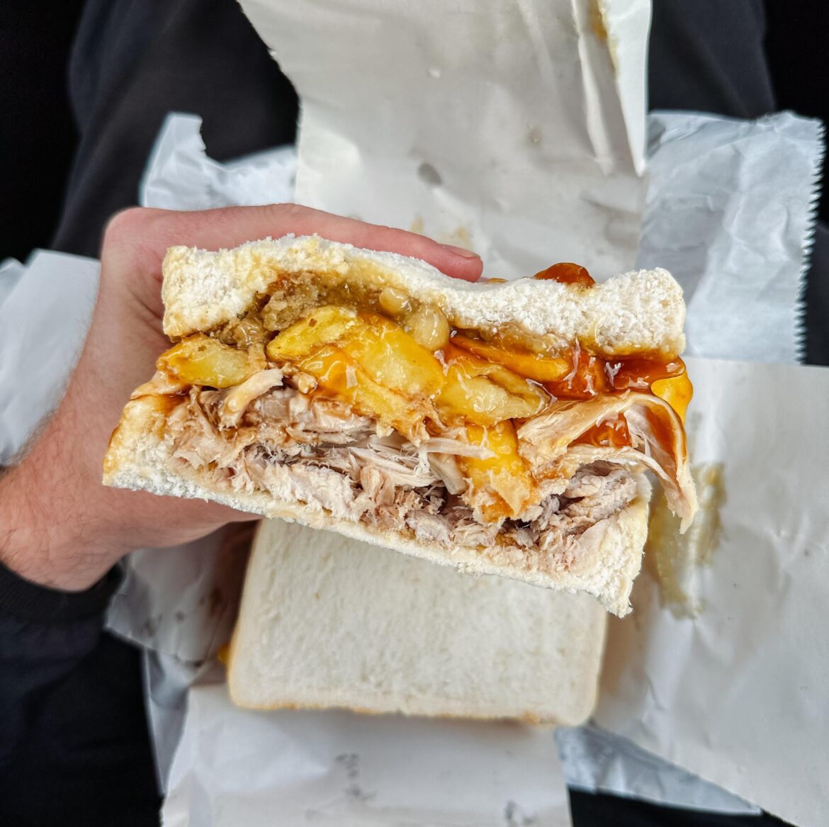 Hot roast pork, stuffing, apple sauce, gravy, chip butty. (Served without napkins)