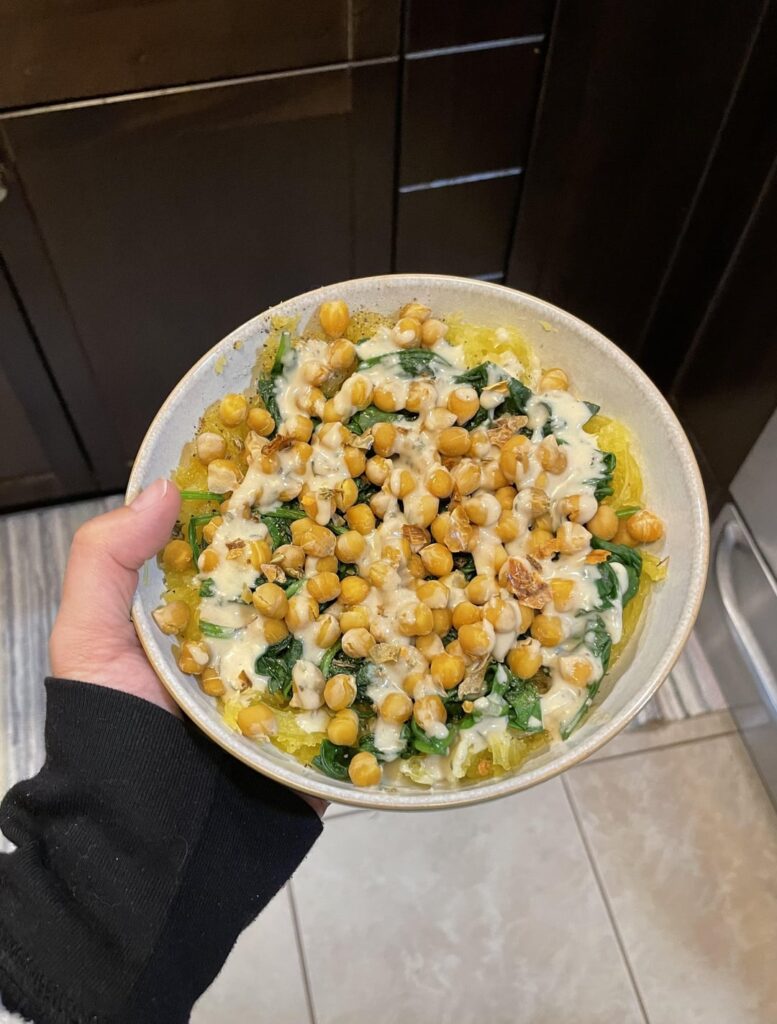 Roasted chickpeas, wilted spinach, and spaghetti squash in a lemon basil tahini sauce! Roasted chickpeas, wilted spinach, and spaghetti squash in a lemon basil tahini sauce!