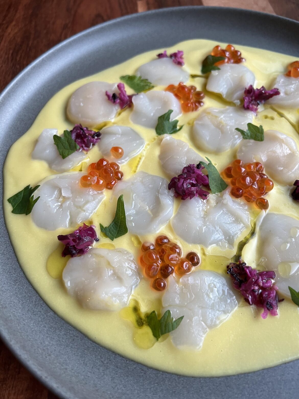 Hokkaido Scallop Crudo | Mango Yuzu Purée I Shibazuke | Ikura | Shiso | Olive Oil | Maldon