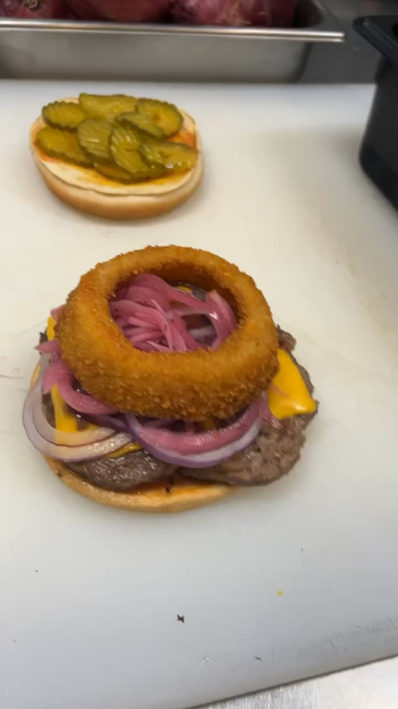 I give you the Quatro Onion Burger. Onions are being attacked right now with the E coli outbreak. Stay strong you fellow bad breath sluts.