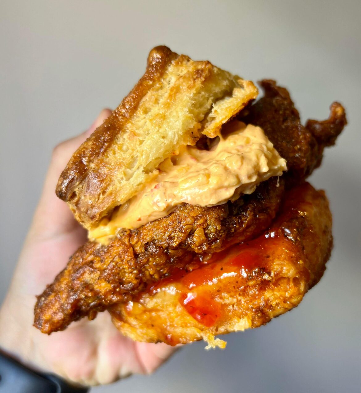 Biscuit Goodness – Nashville Hot Chicken, Spicy Pepper Jelly, and Pimento Cheese on a Honey-Buttered Biscuit