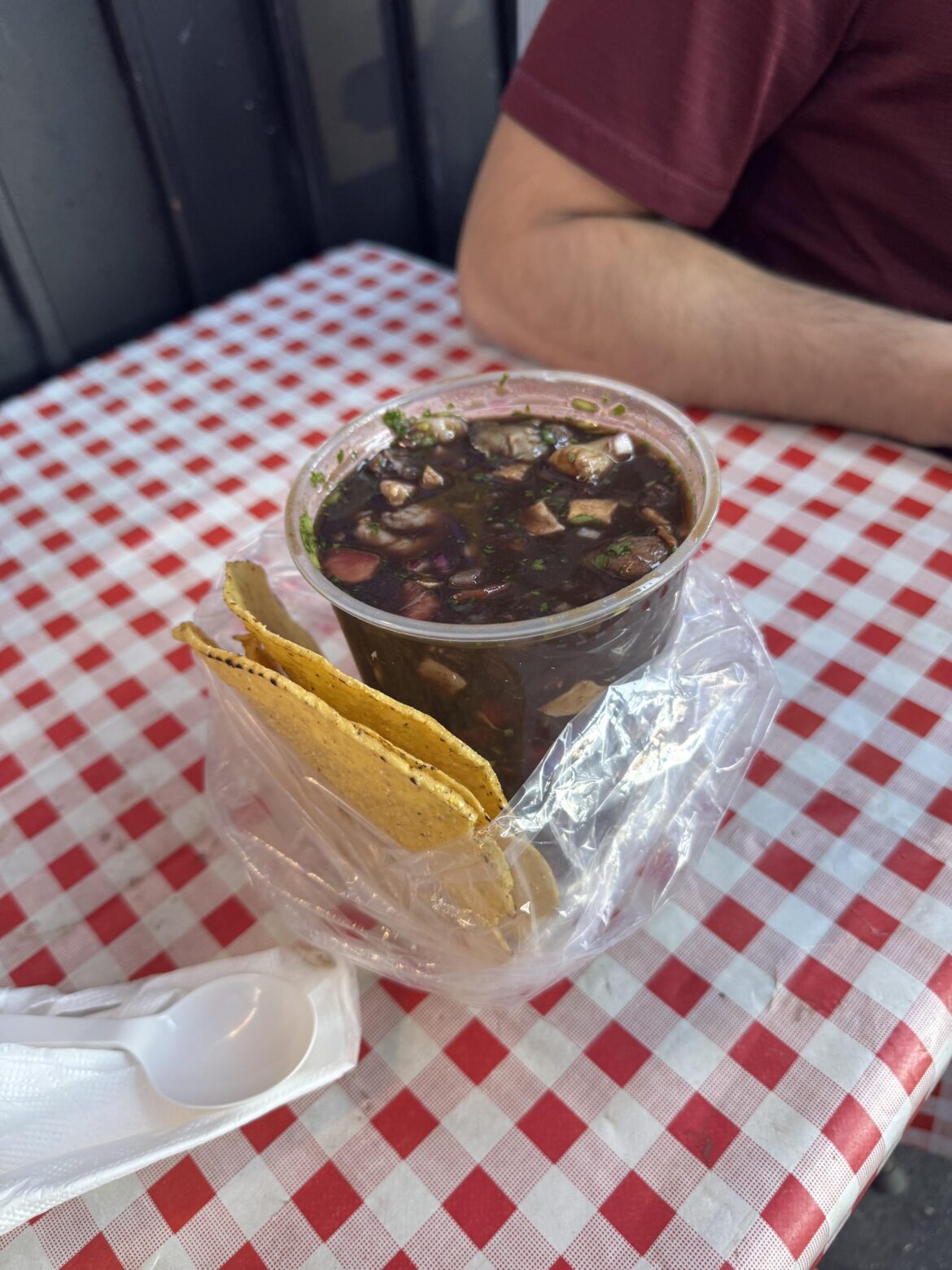 Spicy cocteles with bloody clam, shrimp, crab, scallops, and bulls balls at El Salvadorian Corridor