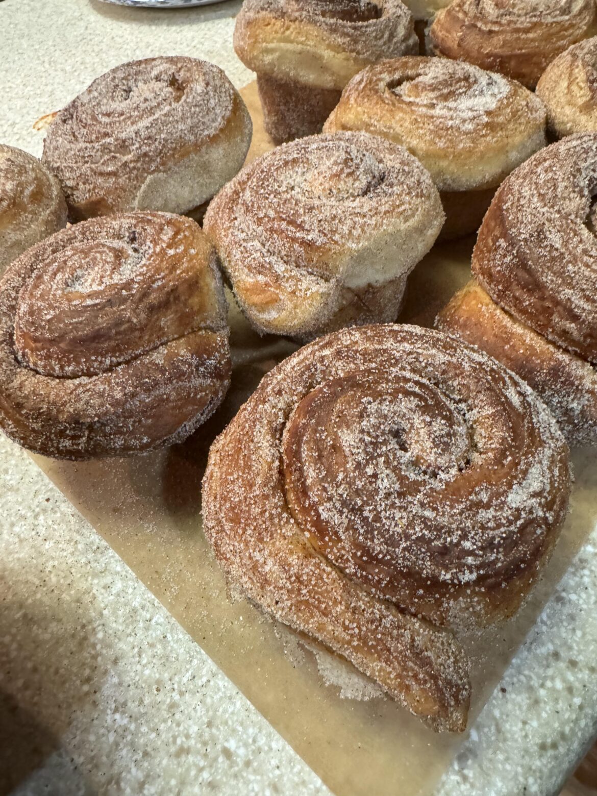 Morning Buns. Laminated dough rolled and dusted with cinnamon-sugar-orange zest. I stopped making croissants for a while after making these for the first time.