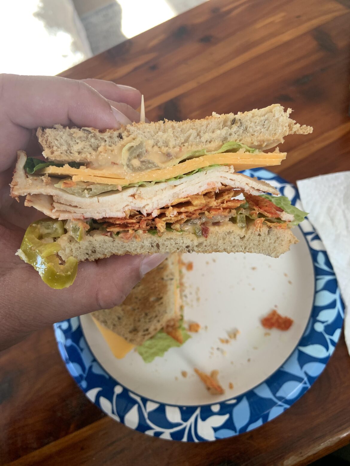 Chipotle chicken, cheddar, lettuce, hummus/wickles hot pepper relish/mikes mustard, jalepenos, Buffalo ranch Doritos on seeded rye.
