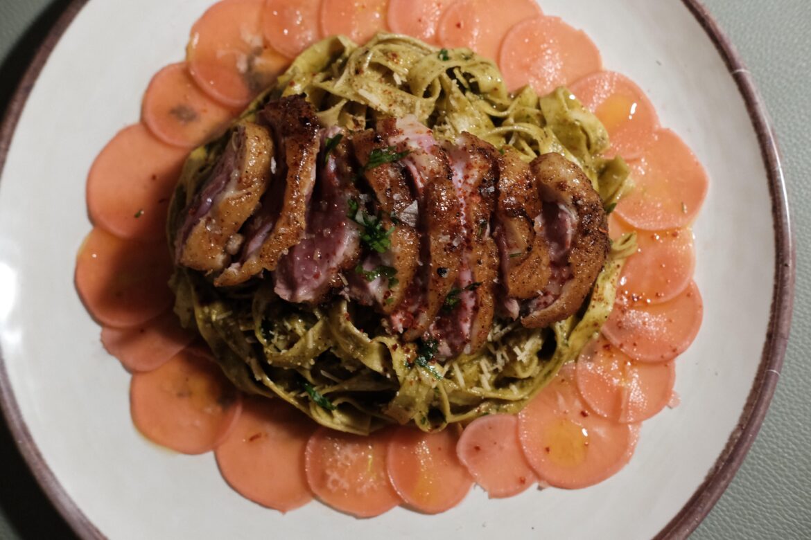 Fermented Shrimp Paste (belachan), Radish Greens, and Spring Onion Pesto Linguine, Quick Pickled Radishes, Duck Breast with Beetroot and Truffle Jam Glaze, Garnished w/ Gochigaru and Parsley