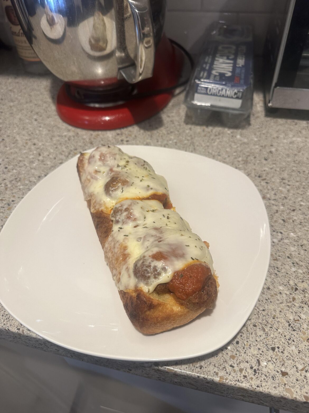Open faced meatball on garlic bread