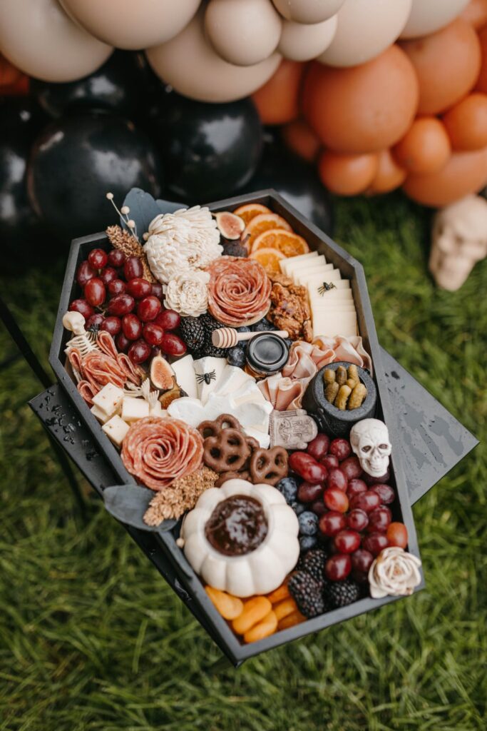 Sharing  pics of my Halloween work over the years. Halloween charcuterie is always fun !! The palm leaf board is the one I created for a class I’m teaching next week .