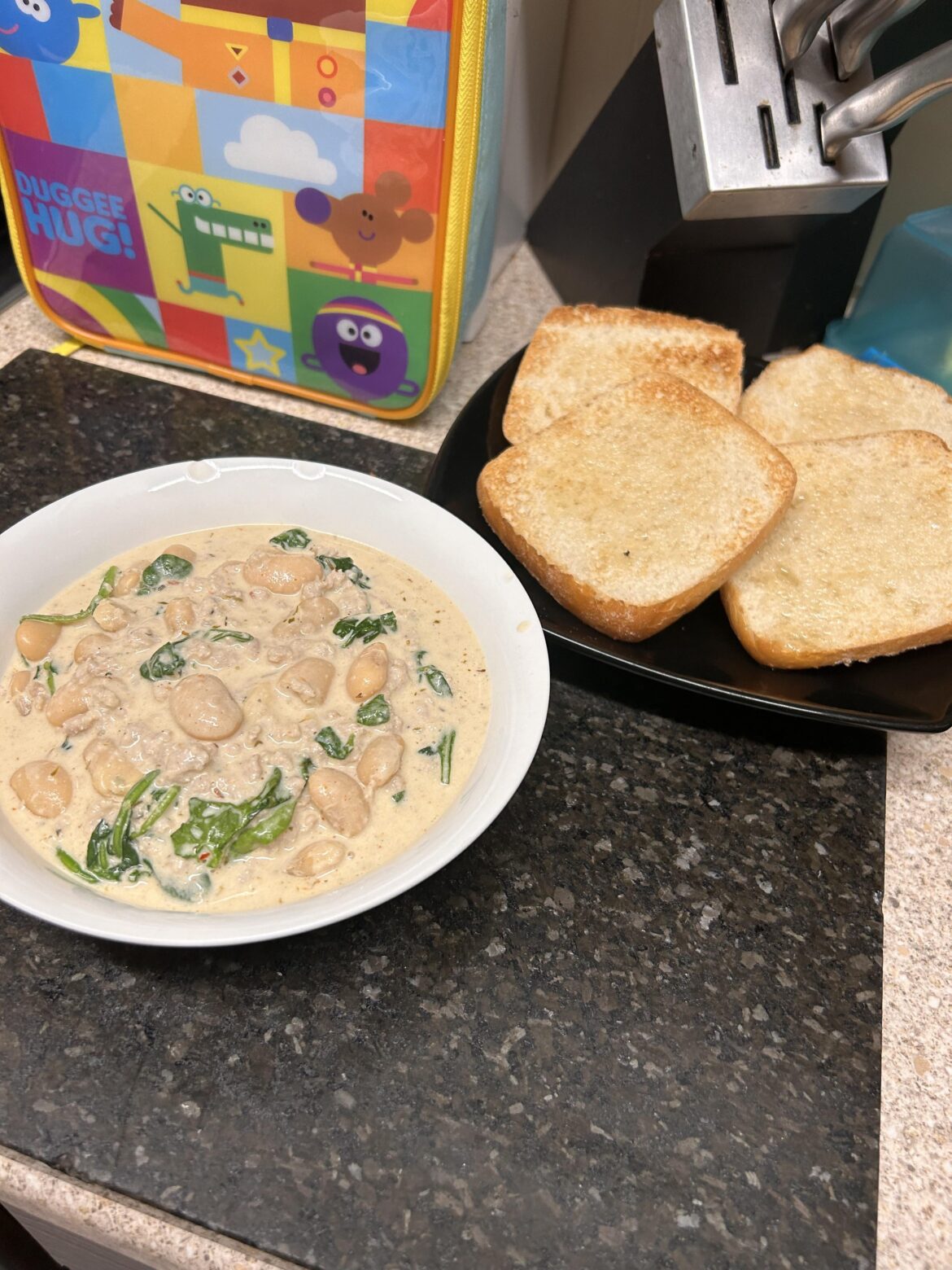 One pot sausage and butter bean cassoulet with baby spinach and ciabatta 🧈🫘